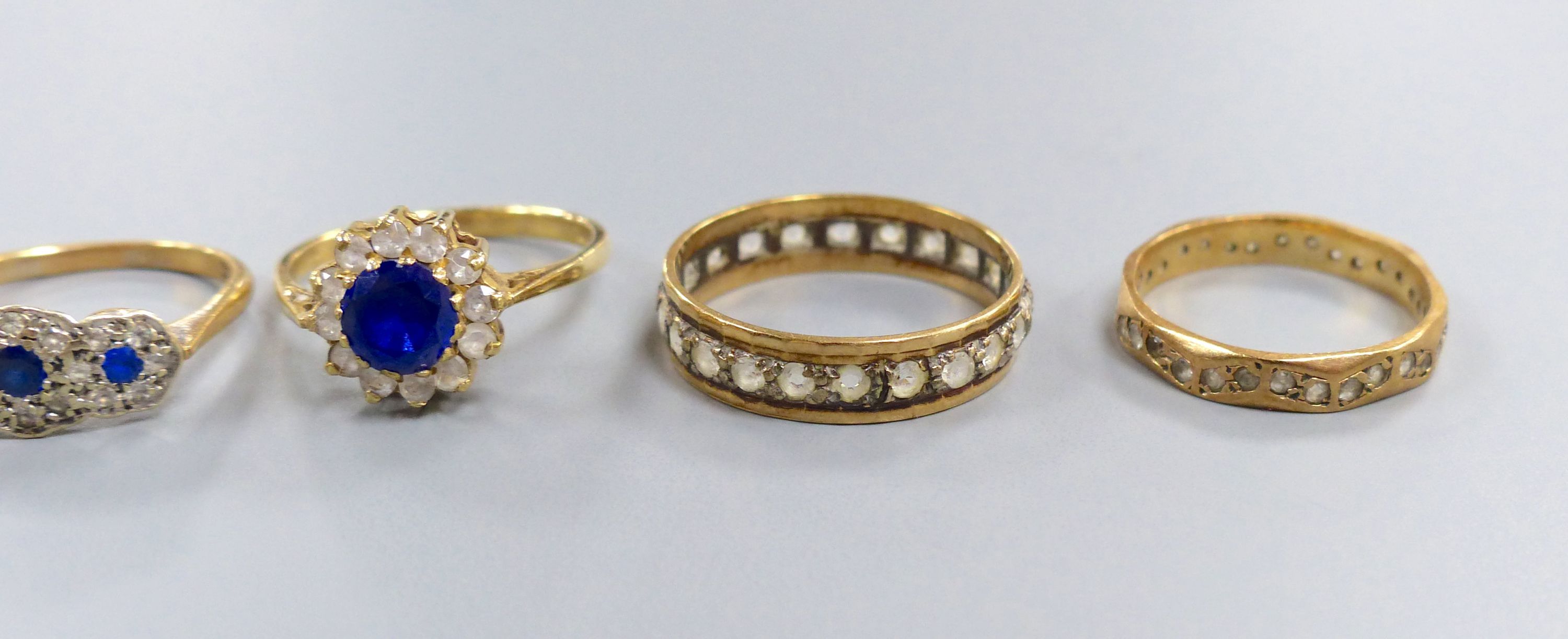 Six 9ct gold rings, variously gem or paste-set, gross 13.7 grams.